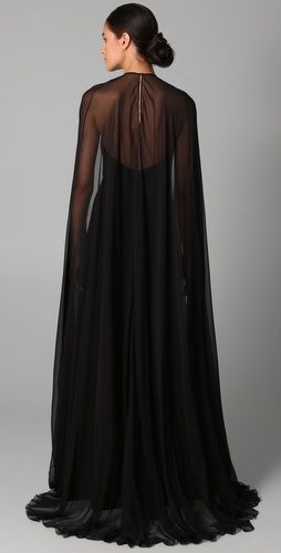 #reem acra halter gown with chiffon cape  black woment #2dayslook #dresses #luxuryfashion  www.2dayslook.com Black Halter Gown, Elder Goth, Recital Dress, Chiffon Cape, Robes Glamour, Reem Acra, Halter Gown, Black Halter, Cape Dress