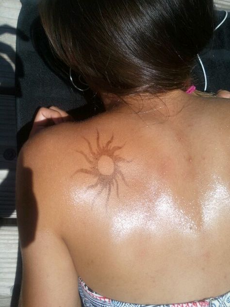 Tanning. Sun henna tattoo :) Flesh Colored Tattoo, Sun Lower Back Tattoo, Back Sun Tattoo Spine, Light Brown Tattoo, Brown Ink Tattoo On Brown Skin, Tattoo Brown Ink, Hawaiian Sun Tattoo, Sun Tattoo On Stomach, Dark Brown Tattoo