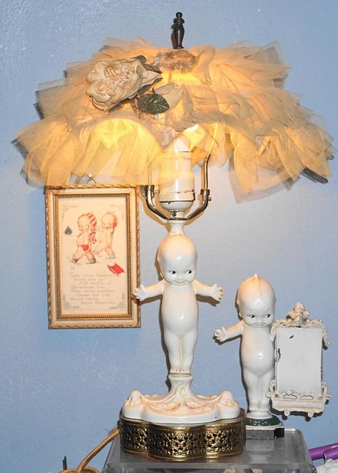 This extremely RARE and very hard to find antique Rose O’Neill Kewpie metal lamp has its original metal shade and measures 15” tall. The Kewpie lamp measures 10.75” with a 6” metal Kewpie. The lamp is in wonderful shape. The paint is original. The Kewpie has adorable left side Kewpie Collection, Rose O Neill, Dorm Inspiration, Kewpie Doll, Kewpie Dolls, Barbie Dream House, Metal Lamp, Antique Roses, Cute Room Decor