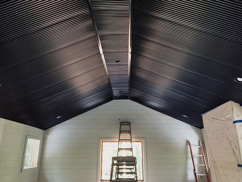 Barndominium With Black Ceiling, Black Vaulted Ceiling, Corrugated Tin Ceiling, Black Industrial Ceiling, Black Metal Ceiling, Lofted Cabin, Barndominium Interior, Corrugated Tin, New House Living Room