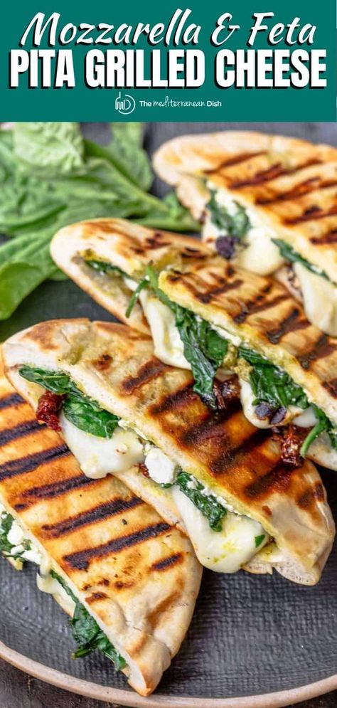 Not your average grilled cheese sandwich! Pita Grilled Cheese w Mediterranean faves like mozzarella, feta, sundried tomatoes, basil pesto. Sommer Mad, Panini Recipes, Plats Healthy, God Mat, Mediterranean Dishes, Mediterranean Diet Recipes, Mediterranean Recipes, Grilled Cheese, Veggie Recipes