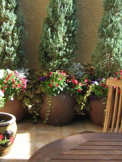 It’s spring and it’s time to bring out your plants in pots on your patio!  The pots you place your plants on can be so much more than just a vessel to hold your plants, they can be just as an important part of the show! Decorate your patio with pots that are full of... Read More Tuscan Garden Design, Tuscan Style Garden, Tuscan Patio, Tuscan Courtyard, Style Toscan, Tuscan Garden, Tuscan Decor, Small Patio Garden, Patio Pots