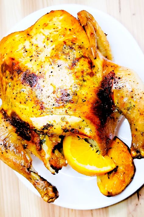 The orange and lemon are added to make a juicy and flavorful whole-roasted chicken any night of the week. #citrusroastchicken #roastchicken #wholechickenrecipes #chickenrecipes Lemon Rosemary Roasted Whole Chicken, Orange Whole Chicken Recipe, Orange Roasted Chicken, Whole Roasted Chicken Recipes, Orange Marmalade Chicken, Slow Roast Chicken, Homemade Takeout, Oven Roasted Whole Chicken, Whole Baked Chicken