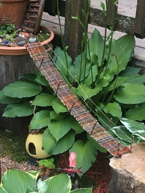 Rope bridge Miniature Bridge Diy, Fairy Garden Bridge Diy, Diy Fairy Bridge, Bridge Diy, Fairy Garden Bridge, Fairy Bridge, Kids Fairy Garden, Rope Bridge, Fairy Tree Houses