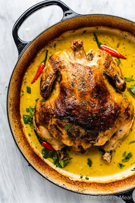 PIN TO SAVE IT FOR LATER! Coconut Milk Braised Chicken is a delicious whole chicken recipe that is very easy to make. The chicken is coated with a lemongrass and ginger rub then slow-cooked in coconut milk. The flavorful sauce is incredible poured over rice or cauliflower rice! #theendlessmeal #chicken #coconut #coconutmilkchicken #braisedchicken #wholechicken #thai #thaichicken #thaicurry #chickencurry #sugarfree #chickenrecipes #whole30 #paleo #paleorecipes #keto #lowcarb #ketochicken Whole Chicken Curry, Boiled Whole Chicken Recipes, Milk Braised Chicken, Best Whole Chicken Recipe, Braised Chicken Recipes, Whole Chicken Recipe, Coconut Milk Chicken, Chicken Coconut, Whole Chicken Recipes