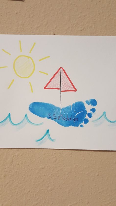 Footprint sailboat Footprint Boat Craft, Summertime Art For Toddlers, Sailboat Footprint Craft, Beach Infant Crafts, June Art For Toddlers, Infant Room Classroom Ideas, Beach Footprint Art, Ocean Art For Infants, Ocean Footprint Art