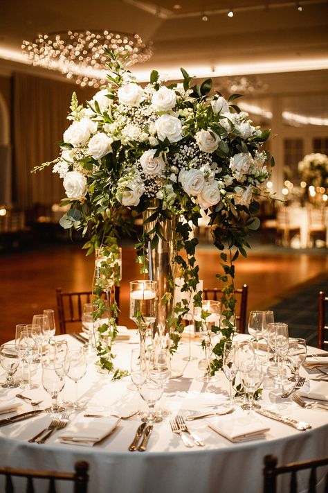 Tall floral centerpiece in terrace room at nybg wedding Tall Table Settings Wedding, Floral Wedding Centerpieces Tall, Candelabra Wedding Centerpieces Flowers, Raised Centerpieces Wedding, Big Wedding Centerpieces, High Centerpiece Wedding, Tall Floral Centerpieces Wedding, Nybg Wedding, Large Wedding Centerpieces