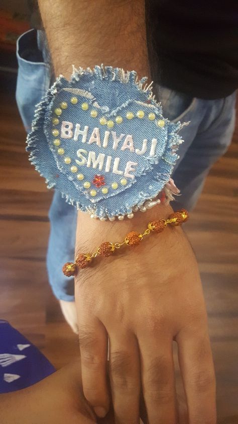 This is a handmade rakhi made out of upcycled  denim pants. Every rakhi has a quote or a slang for 'Brother' in Hindi,Marathi and English. Homemade Rakhi Ideas, Homemade Rakhi, Rakhi Craft, Handmade Rakhi Designs, Rakhi Making, Diy Classroom Decorations, Upcycled Jeans, Handmade Rakhi, Rakhi Design