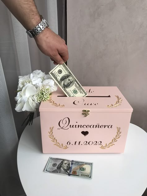 "Card Box, Money Box, Rustic Quinceañera Decor, Custom Card Box These at the same time simple and beautiful envelope boxes, will help you to complement and decorate the appearance of your holiday \"Quinceañera\", as well as attract the attention of your guests and allow them to easily throw their envelopes.✉ You can use this box as a storage for money or something else. We create exclusive personalized dream accessories  TECHNICAL DETAILS🔧: Envelope box sizes: 11.8 x 7.8 x 7.1 in (30 cm length x 20 cm height x18 cm width). Material they are made of is the plywood. + paint *money are not included (wink)   DELIVERY AND RETURN Express delivery 7-9 business days (extra charge) and standard delivery 14-21 business days . You can also exchange the product. Buyers are responsible for the return Card Box For Quinceanera Gift Table, Quince Gift Box Ideas, Quince Envelope Boxes, Lavender Gold Quinceanera, Quince Gift Card Box Ideas, Quince Box For Money, Quinceanera Reception Decorations, Quince Box Card Holders, Quinceanera Themes Simple