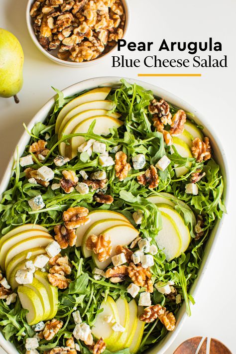 Taylor Farms Arugula has a variety of delicious uses in the kitchen, but this sweet and savory salad recipe may be among the best. Fresh arugula is topped with sweet, tangy sliced pears, flavorful blue cheese, crunchy walnuts, and a perfectly sweet and zesty honey mustard vinaigrette you can whip up with some common ingredients you likely already have on hand. It tastes incredible, looks pretty darn fancy, and takes just a few minutes to prepare. Enjoy! Pear Salad With Walnuts And Feta, Pear Salad Blue Cheese, Arugula Salad With Pears And Goat Cheese, Arugula Salad Recipes Goat Cheese, Pear Walnut Goat Cheese Salad, Pear Walnut Blue Cheese Salad, Pear Arugula Salad, Pear And Blue Cheese Salad, Blue Cheese Chicken