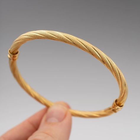 🌟 Just In at Hunter Fine Jewellery! 🌟 This 9ct Yellow Gold Bangle Bracelet features textured an attractive twist design and innovative spring-hung lock embody sophistication and security. Weighing 7.7 grams, it’s in pristine condition, ready to elevate your collection. ✨ DM anytime! Michael :) #GoldBangle #ItalianDesign #SecureElegance #goldbangles #goldbracelet #italiangold #bangles #braceletsforsale 22k Gold Bangles, Modern Gold Jewelry, Yellow Gold Bangle, Gold Jewelry Stores, Mens Gold Rings, Golden Jewelry, Bangles Jewelry Designs, Gold Bangles Design, Gold Bangle Bracelet