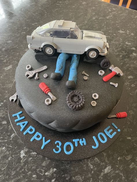 Mechanic tyre cake Cakes For Mechanics, Car Themed Birthday Cake For Men, Mechanic Theme Cake, Mechanic Cakes For Men, Cake For Mechanic, Mechanic Party Ideas, Mechanic Birthday Party Ideas, Mechanic Cake Ideas, Car Mechanic Cake