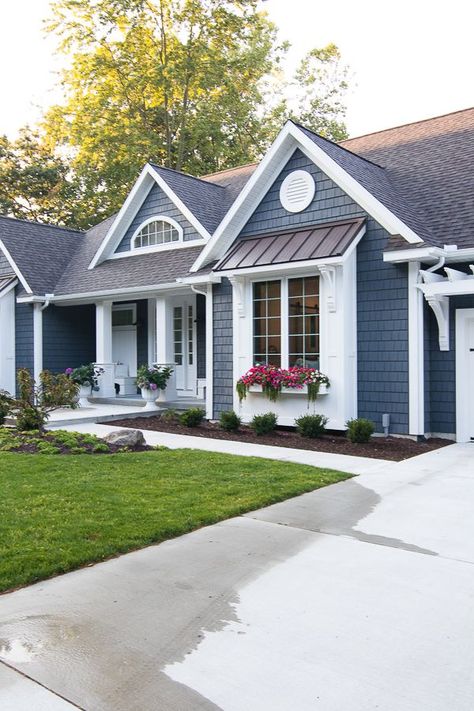 Lake House Exterior - Dark grey charcoal vinyl shake siding with white trim, pergola, window boxes and corbel details. Blue With White Trim House, Blue Grey White House Exterior, Exterior Paint Colors For Bilevel House, Navy House With White Trim, Mastic Natural Slate Siding, Navy Exterior House Colors White Trim, Dark Blue Houses With White Trim, Trendy House Paint Colors Exterior, Navy Blue And White House Exterior