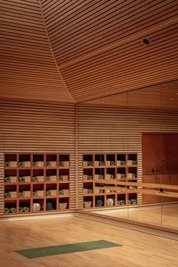 Yoga Studio | Invisible Studio Fitness Room Design, Modern Yoga Studio, Task Ideas, Earth Yoga, Yoga Shala, Wooden Panelling, Rammed Earth Wall, Copper Tiles, Gym Pool