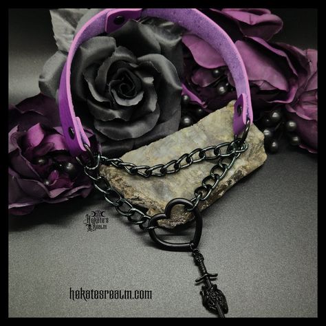 🖤🗡️🫀Stabbed Heart Collar Choker! 💜 Leather Collar, Black Cuban Link Chain, Black Heart, & Black Stabbed Heart Charms. ❤️What’s your fav color? . 🔥SHOP NOW!🔥 . 🌛hekatesrealm.com🌜 . 🌛🌝🌜 #hekatesrealm #hekatejewelry #valloween #everydayishalloween #halloweeneveryday #halloweenvibes #horrorlover #gothheart #gothicheart #gothicsoul #gothicvibes #gothicforever #gothicstyle #gothicbeauty #romanticgoth #gothicvampire #vampiregoth #gothicwitch #gothwitch #gothicjewelry #gothjewelry #gothicgirl #altgir... Locking Collar, Leather Choker Collars, Dark Jewelry, Grunge Jewelry, Fav Color, Collar Choker, Romantic Goth, Layered Chokers, Goth Jewelry