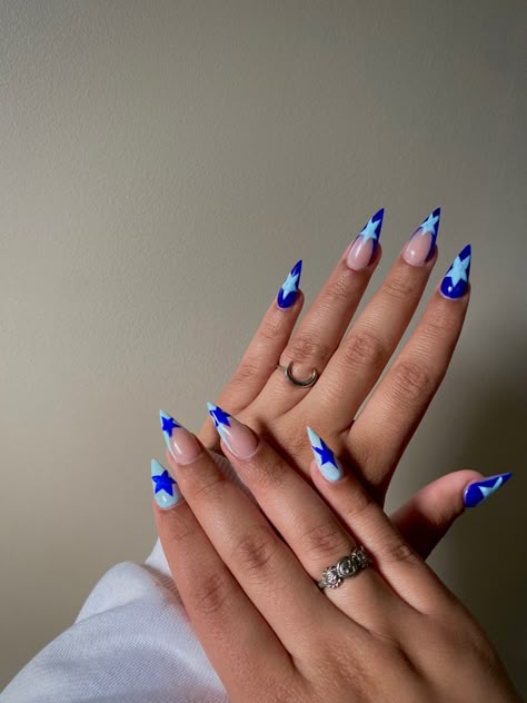 2 shades of blue | y2k design | stargirl design | stiletto nails 2 Shades Of Blue Nails, Stiletto Nails Medium, Stellio Nails, Star Nail Designs Y2k Simple, Stiletto Nails Blue, Blue Nail Designs Stiletto, Blue And Silver Star Nails, Star Nails Y2k Almond Shape, Star Nails Y2k Coffin