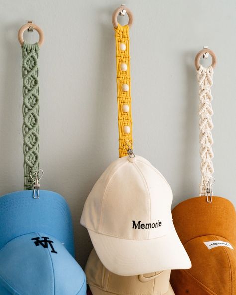 Our Macrame Cap Rack is here to save the day! 🦸‍♂️ This farmhouse decor masterpiece not only keeps your caps organized but also adds a touch of boho charm to any space. Whether it's for a man cave, a baseball-themed room, or just because you love artisanal goodies, this macrame hat holder is the answer. 👉 Check out more athttps://beandaikon.com/products/macrame-cap-holder-for-stylish-cap-organization or contact us directly! #artisanmade #macramedecor #bohemiandecor #artisanalpresents #homes... Macrame Hat Holder, Organize Baseball Hats, Wall Mounted Hat Rack, Baseball Theme Room, Room Decor For Men, Macrame Hat, Cap Rack, Cap Organizer, Cap Holder