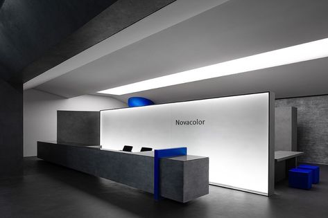 Novacolor Paint Showroom – ARQA Paint Showroom, Metallic Paint Walls, Visual Planning, Geometric Volume, Image Wall, Flexible Space, Reception Design, Counter Design, Showroom Design