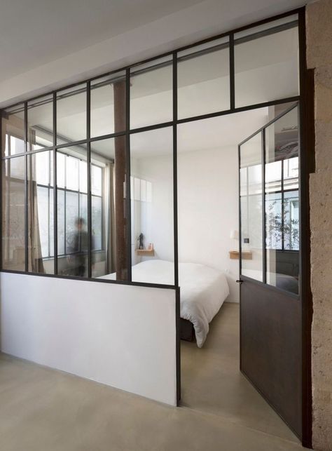 glass wall/window Paris Loft, White Wall Paint, Glass Partition Wall, Industrial Windows, Loft Wall, Wooden Floating Shelves, Glass Room, White Comforter, Glass Walls