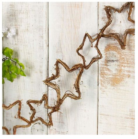 PRICES MAY VARY. VINE GARLAND - A rustic Natural Grapevine Twig Stars Garland for decorating your home or special event. This garland is made from a collection of assorted-sized stars, made from natural grapevine twigs. These stars are joined together to form a unique woodland chain garland. Size: 5 feet long (end to end) Assorted Star Sizes: 4 inch high x 3-1/2 inch wide 2-3/4 inch high x 2-1/2 inch wide VERSATILE - Designed for a variety of occasions, this garland adds a touch of rustic elegan Gold Star Garland, Garland Alternatives, Chandelier Garland, Rustic Christmas Garland, Primitive Garland, Woodland Garland, Twigs Decor, Rustic Garland, Stars Garland