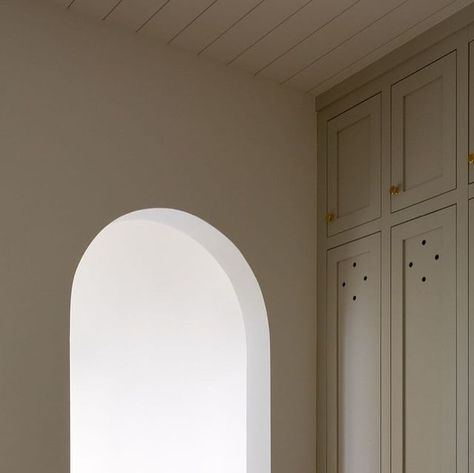 Light and Dwell on Instagram: "The cutout detail on the mudroom cabinets adds a European detail that otherwise would be boring floor to ceiling cabinets.  This space doesn’t need much, because the hard finishes really speak for themselves. #lessismore #utaheuropeanmodernproject 

Photographer: @amybartlam" To Ceiling Cabinets, Ceiling Cabinets, Terracotta Flooring, Arched Entry, Floor To Ceiling Cabinets, Mudroom Cabinets, Light And Dwell, Green Cabinets, Brick Flooring