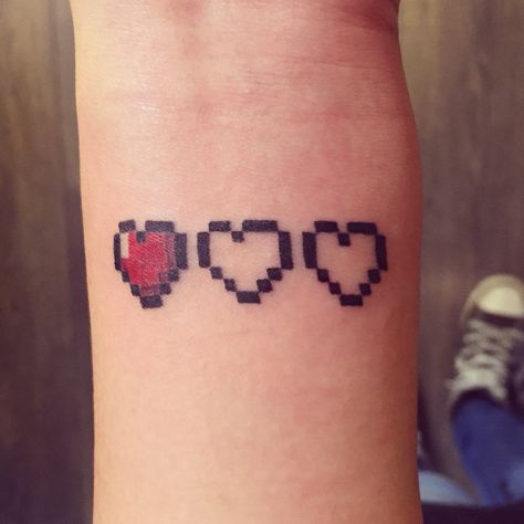 Pixel hearts tattoo Pixel Heart Tattoo, Minecraft Tattoo, Minecraft Heart, Pixel Tattoo, Hearts Tattoo, Gamer Tattoos, Pixel Heart, Gaming Tattoo, Tattoo Videos