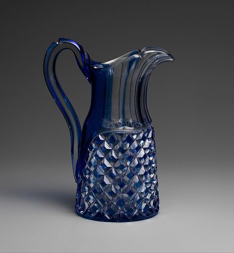 Pitcher    Manufacturer:Brooklyn Flint Glass Company (American, Brooklyn, New York, 1824–1868)  Engraver:Possibly cut by Joseph Stouvenel and Company (1851-1857)  Date:1850–55  Geography:Made in New York, New York, United States  Culture:American  Medium:Blue-cut-to-clear glass  Dimensions:10 3/4 in. (27.3 cm) Flint Glass, Colonial Revival, Glass Pitcher, Glass Pitchers, Glass Company, Cordial, Brooklyn New York, Historical Artifacts, Decanters