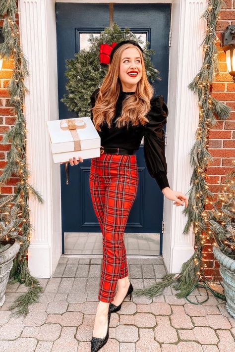 girl smiles holding present wearing plaid pants, a ruffled top and black glitter heels for christmas Preppy Christmas Outfits Women, Christmas Dressy Outfit, Home Holiday Party Outfit, Holiday Womens Outfits, Christmas Tea Party Outfit, Green Christmas Outfit Women, Christmas Work Outfits Women, Work Xmas Party Outfit, Christmassy Outfits