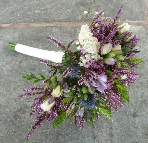 Beautiful Brides Bouquet created with Spray Roses, Freesia, Eryngium, Gypsophilia, Chincherinchee and Heather. Heather Wedding Decoration, Thistle Bouquet Wedding, Thistle Bouquet, Scottish Flowers, Thistle Wedding, Heather Flower, Floristry Design, Violet Wedding, Scottish Wedding