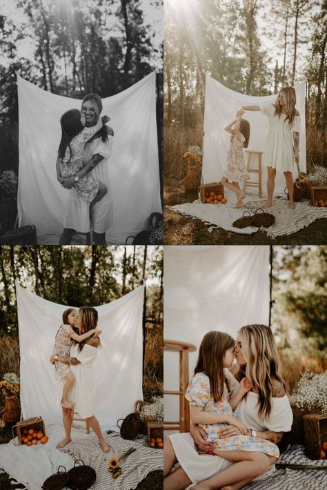 "Mother and child embrace in a dreamy #mommyandmephotoshoot surrounded by #orangesandflowers in #ocalaflorida. The warm colors and natural setting create a serene atmosphere, perfect inspiration for photographers and a heartwarming #mothersdaygiftidea. #motherhoodphotography #whitesheetphotos #familyphotography #bondingmoments #preciousmemories #photographyinspiration #beautifulbackdrops #scenicbeauty" White Sheet Backdrop, Sheet Backdrop, Mommy And Me Photoshoot, Fall Photo Props, Beauty Of Motherhood, Mother Baby Photography, Mommy And Me Photo Shoot, Eleven Eleven, Photography Mini Sessions