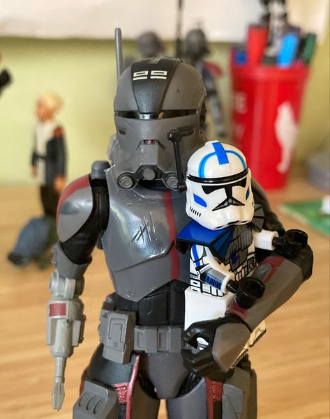 This is a picture of a The Bad Batch The Black Series Echo action figure holding a lego 501st ARC trooper Echo. In this picture the bigger Echo is carrying around the smaller Echo like a toddler. Star Wars Clone, Lego Starwars, Lego Man, Star Wars 2, Bad Batch, Busy Bags, Star Wars Action Figures, Lego Design, Clone Trooper