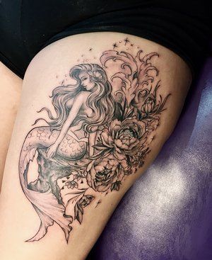 Mermaid Flowers Tattoo, Siren Tattoo Thigh, Mermaid Tattoo On Thigh, Mermaid And Flower Tattoo, Black And Grey Mermaid Tattoo, Mermaid Tattoo With Flowers, Mermaid Cover Up Tattoo, Mermaid Tattoos Thigh, Mermaid Hip Tattoos Women