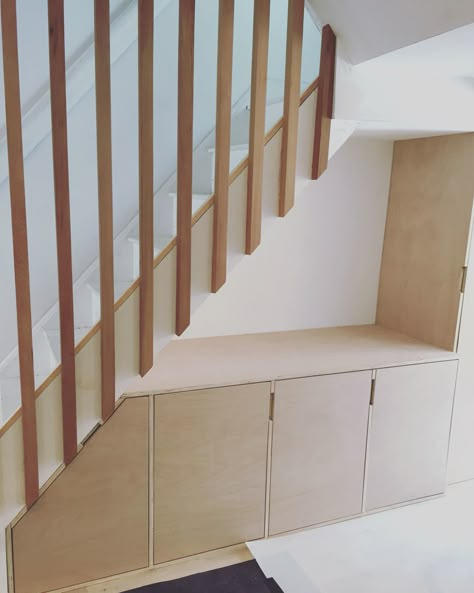 Under-stairs storage made ply wood and banister made from quartered red cedar fence panels. Designed by us.  Instagram - @the.wooden.hill Wooden Bannister Ideas, Stair Banister Ideas, Staircase Banister Ideas, Under The Stairs Storage, Interior Design Under Stairs, Storage Under Stairs, Stair Fence, Stairway Storage, Under Stair Storage