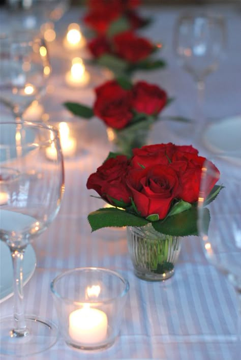 A few Small arrangements for the steps in sanctuary. Red and white roses (from Costco $17 for 2 dozen) greens, baby's breath? Dinner Table Bouquet, Small Red Roses Centerpieces, Small Red Rose Arrangement, Roses In Small Vases, Small Rose Arrangements, Red Flower Table Centerpieces, Simple White Flower Centerpieces, Dinner Flower Arrangements, Roses Table Centerpieces