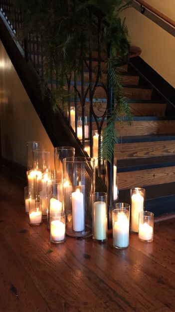 Abacus, Lafayette, Louisiana wedding: Clear cylinders with pillar candles cascading down staircase for a wedding reception; add some romance to your wedding! Candle Heavy Wedding Centerpiece, Floor Pillar Candle Holders, Floor Candles, Candle Stairs, Led Candles Wedding, Candle Dance, Oct Wedding, Wedding Interior, Black Pillar Candles