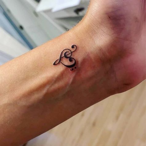 Small Meaningful Tattoos Music, Couple Tattoos Music Notes, Treble Clef Tattoo Finger, Treble Clef With Semi Colon, Musical Heart Tattoo, Semi Colon Music Note Tattoo, Treble Bass Clef Heart Tattoo, Bass And Treble Clef Tattoo, Music And Semicolon Tattoo