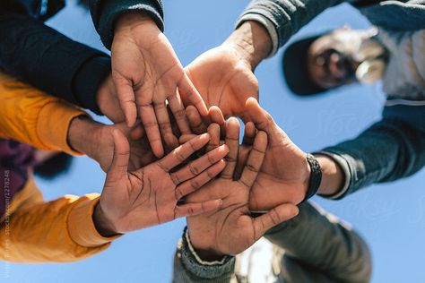 Group of friends stacking hands Hand Group Photos, Group Hands Photography, Group Of People Aesthetic, Mv Ideas, Hand Photos, Improve Employee Engagement, Running Magazine, Shooting Ideas, Employee Development