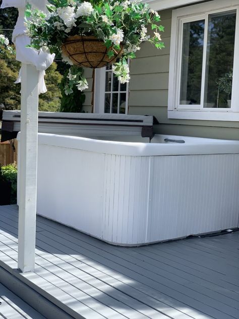 Painting a hot tub, is that a thing? I did it and I love it! Let me show you how I did and what its like a year later! Hot Tub Makeover Before And After, Hot Tub Makeover, Diy Hot Tub Cover Holder, Hot Tub Siding, Diy Hot Tub Surround, Hot Tub Landscape, Tub Paint, Tub Room, Hot Tub Landscaping