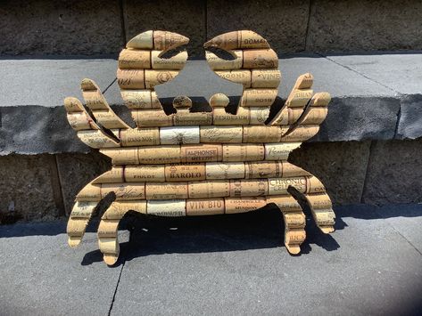 Made to Order. Allow 2-3 days.  This unique handmade wine cork crab wall hanging  will add a touch of whimsy to your beach house.  Made from recycled wine corks. Hanging hardware installed.   Approximately 12 1/2" x 10 1/2". Horseshoe Crab Craft, Cork Reef, Diy Corks, Wine Cork Fishing Lure, Wine Cork Crab, Cork Tray, Wine Cork Board, Christmas Wine Cork Crafts Bed Bath & Beyond, Recycled Wine Corks