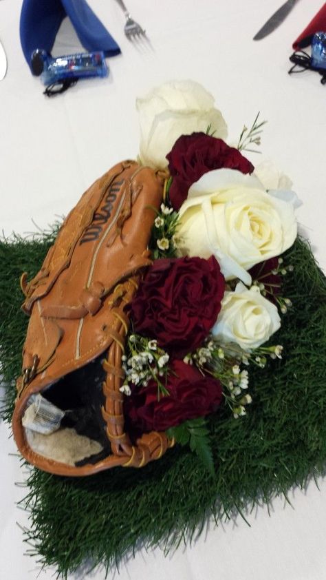 Baseball Theme Table Centerpieces | Baseball Themed Wedding Table Centerpiece! #baseball #mitt #astroturf ... Baseball Wedding Centerpieces, Softball Wedding, Baseball Themed Wedding, Sports Centerpieces, White Wax Flower, Sports Themed Wedding, Wedding Table Themes, Baseball Wedding, Baseball Theme Party