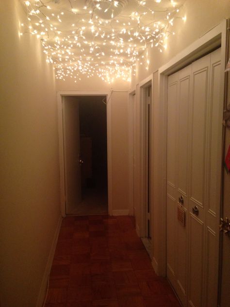 Hallway. Used icicle lights and command strips. Hallway Fairy Lights, Fairy Lights Hallway, Hallway Christmas Lights, Hallway Christmas, Uni House, House Party Decorations, 18th Bday, House Essentials, Icicle Lights