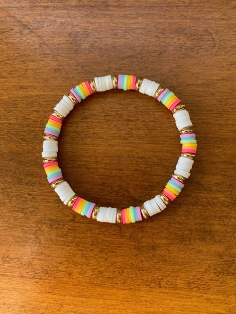 bracelet size is about 6.75 inches :) Preppy Make Bracelet Aesthet, Preppy Heishi Bead Bracelet, Preppy Heshi Bead Bracelets, Clay Bead Necklace Combos, Clay Bead Shell Bracelet, Rainbow Heishi Bracelet, Bracelets Inspo Clay Beads, Clay Was Bracelet Ideas, Bracelet Ideas For Small Business