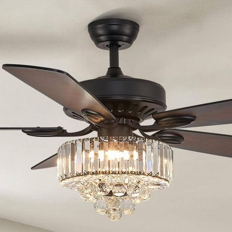 Upgrade your home with our 52-in. Modern Black Fandelier Ceiling Fan. This elegant fixture combines a traditional fan with a crystal chandelier, featuring a durable black metal frame and five wooden blades. The reversible motor ensures year-round comfort, and the included remote allows you to control the 6 wind speeds, 1/2/4 hour timer, and separate light functions with ease. Ideal for any room in your home, this fandelier adds sophistication and practicality. Enjoy easy installation with 2 incl