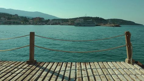 Download the free HD stock video - Ocean view from a wooden dock. This video features Ferries, Travel and Coast. Available for free on Mixkit.co. Wave Boat, Mystic Pizza, Nature Sea, Ferry Boat, Ocean Landscape, Free Stock Video, Small Town, Ocean View, Small Towns