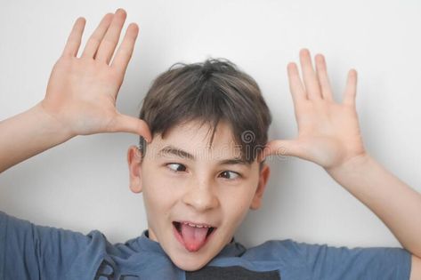 Cross Eyed Boy With Silly Expression Stock Image - Image of class, clown: 206513195 Class Clown, Worry Face Expression, Clown To Clown Conversation, Shocked Face Meme, Surprised Face Meme Humor, Cross Eyed, Clown Behavior Memes, Make Funny Faces, Funny Expressions