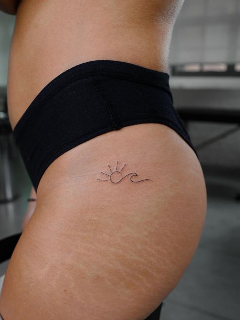 55 Meaningful Fine Line Tattoos for Minimalist Women Fine Line Woman Tattoo, Sun And Wave Tattoo, Tattoo Leo, Ocean Wave Tattoo, Side Hip Tattoos, International Tattoo, Cowgirl Tattoos, Tattoos Infinity, Sister Tattoo