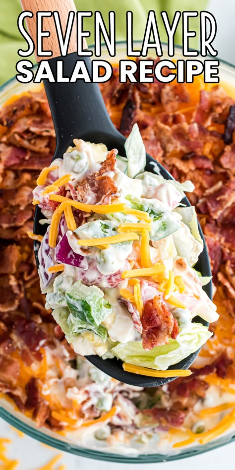 When it comes to potlucks and cookouts, nothing beats a 7 Layer Salad! Make this recipe ahead of time for an easy side dish everyone loves! #BreadBoozeBacon #7layersalad #sevenlayersalad #saladrecipe #potluck #cookout #summer #4thofjuly #fourthofjuly #memorialday #laborday Potluck Seven Layer Salad, 7 Layer Salad No Peas, Best Salad For Potluck, 6 Layer Salad, Cold Veggie Recipes, Salad Recipes Potluck, Healthy Southern Side Dishes, 5 Layer Salad, Easy Seven Layer Salad