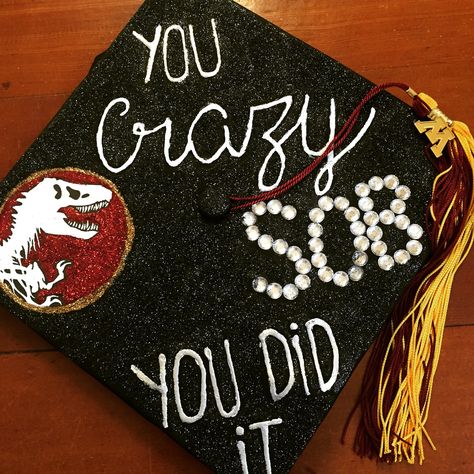 Pretty proud of the Jurassic Park cap I made for graduation! Jurassic Park Graduation Cap, Dinosaur Graduation Cap, Dinosaur Graduation, Senior Night Posters, Graduation Hats, College Graduation Cap Decoration, Grad Caps, Cap Decoration, Graduation Cap Designs