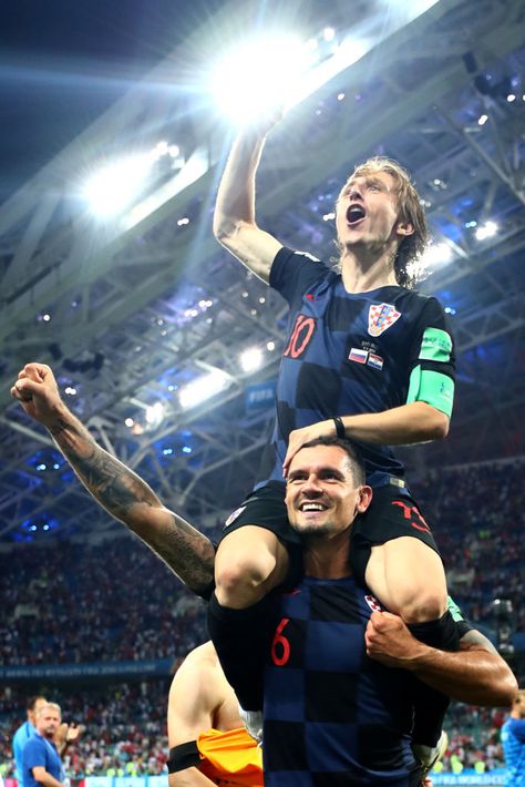 SOCHI, RUSSIA - JULY 07:  Dejan Lovren of Croatia and Luka Modric of Croatia celebrate following their sides victory in the 2018 FIFA World Cup Russia Quarter Final match between Russia and Croatia at Fisht Stadium on July 7, 2018 in Sochi, Russia.  (Photo by Lars Baron - FIFA/FIFA via Getty Images) Croatia Pictures, Croatia Soccer, Football World Cup 2022, Dejan Lovren, World Cup Semi Final, Sochi Russia, World Cup Russia 2018, Luka Modric, Team Wallpaper