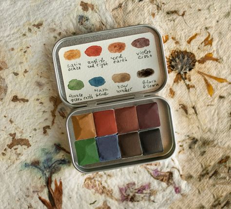 Handmade watercolor paint set, Mineral watercolor palette. Mini travel paint set. Earth Handmade palette, Natural Watercolor Paint Set, Mineral Watercolor, Eco-friendly Paint, Artist Gift Set, Watercolor Gift, Set. This palette is a collection of eight handcrafted eco-friendly watercolors from natural sources. It is a handmade watercolor set of eight individually wrapped half pans in a metal tin. Our watercolors are artist quality, have excellent lightfastness, and are non-toxic - cadmium, cobal Watercolor Paint Palette, Professional Watercolor Set, Clay Watercolor Palette, Altoid Watercolor Palette, Diy Mini Watercolor Palette, Natural Watercolor, Tiny Watercolor Palette, 2023 Board, Clove Essential Oil